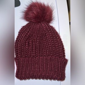 Burgundy puff ball knitted hat
